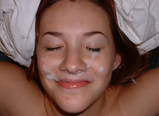 smiles with cum on her face